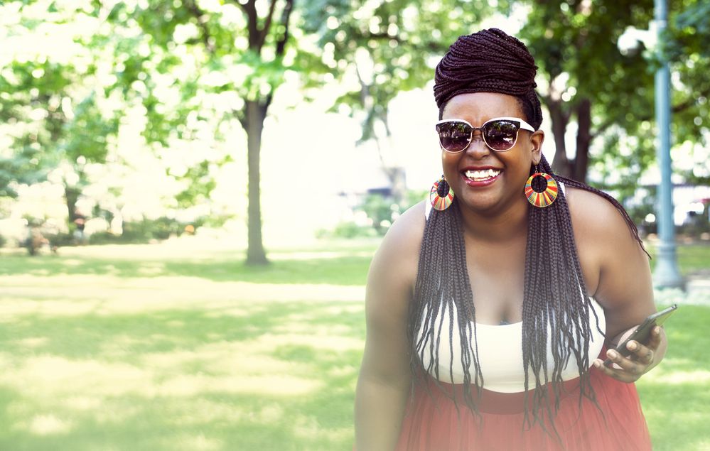 woman-fashion-model-laughing-at-park.jpg